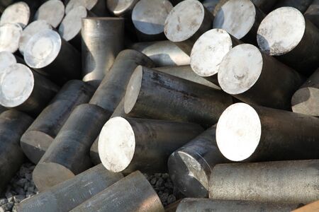 a stack of aluminum casting in stock for background useの写真素材