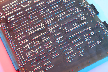 Dirty old printed circuit board with computer chipsDirty old printed circuit board with computer chipsの写真素材