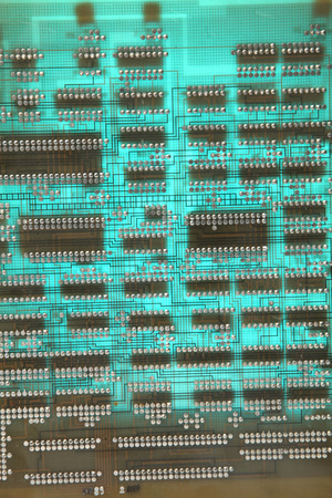 Dirty old printed circuit board with computer chipsの写真素材
