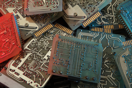 Dirty old printed circuit board with computer chipsの写真素材