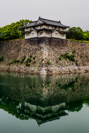 Osaka castle walls reflecting in waterのeditorial素材