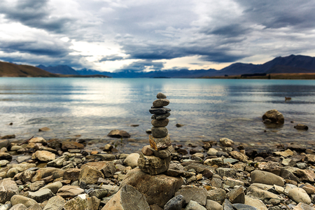 Stone pyramid on the shore of lake Tekapo, South Island, New Zealandの写真素材