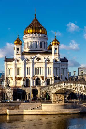 View of Cathedral of Christ the Saviour in Moscow with bridge over Moskva river on a sunny dayの写真素材
