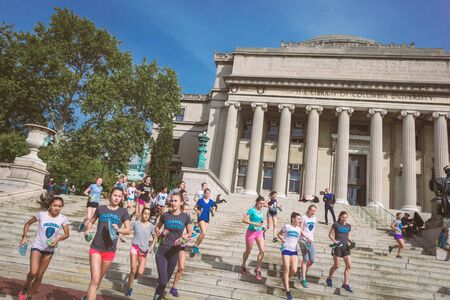 NEW YORK, USA - OCTOBER, 2015: Students running on Columbia University Library building stairs