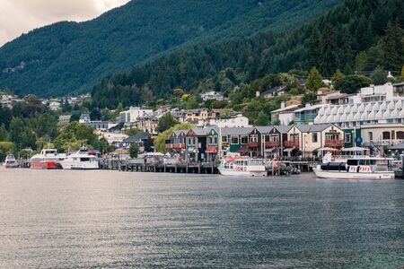 QUEENSTOWN, NEW ZEALAND - DECEMBER 2017: Evening view of Queenstown waterfront and lake Wakatipuのeditorial素材