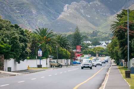 HERMANUS, SOUTH AFRICA - NOVEMBER, 2018: Central road in small coastal town of Hermanus between the ocean and mountainsのeditorial素材