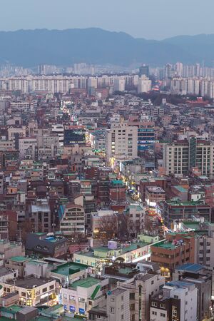 SEOUL, KOREA - MARCH, 2019: Evening view of Songpa-gu district and lights of food street