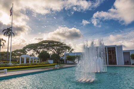 OAHU, USA - JUNE, 2018: Laie Temple with beautiful fountains and garden sunset view on Oahu island, Hawaiiのeditorial素材