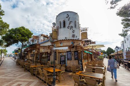 CALA D'OR, SPAIN - JUNE, 2016: Walking street with restaurants in center of Cala D'Or, Mallorca, Spain.のeditorial素材