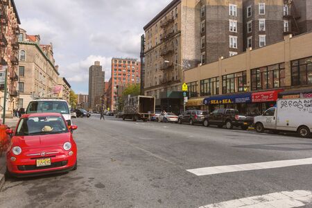 NEW YORK, USA - OCTOBER, 2013: Street of Harlem district with cafes and bars.
