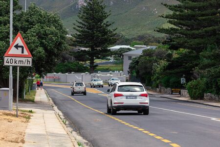 HERMANUS, SOUTH AFRICA - NOVEMBER, 2018: Central road in small coastal town of Hermanus between the...