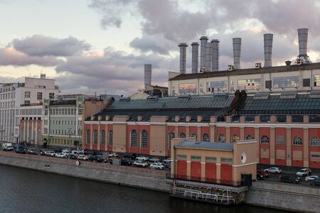 Thermal power station with steaming pipes evening view in Moscow downtownの写真素材
