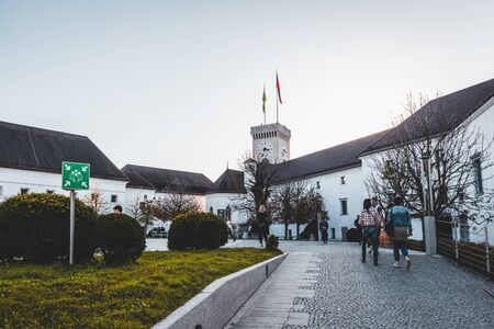 LJUBLJANA, SLOVENIA - OCTOBER, 2019: Ljubljana castle yard with tourists and clock tower viewのeditorial素材