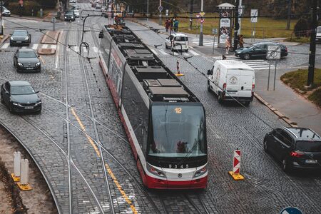 PRAGUE, CZECH REPUBLIC - OCTOBER, 2019: Tram and cars urban traffic view in historical center of...