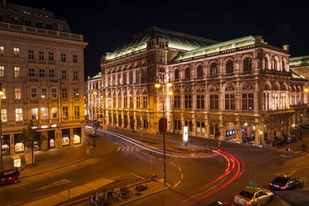 VIENNA, AUSTRIA - OCTOBER, 2019: Vienna Opera House night view with traffic motion lightsのeditorial素材