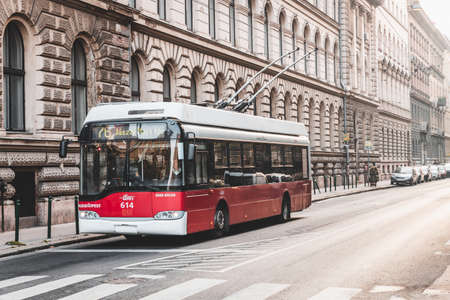BUDAPEST, HUNGARY - OCTOBER, 2019: Red modern trolley on the street of Budapest historical centerのeditorial素材