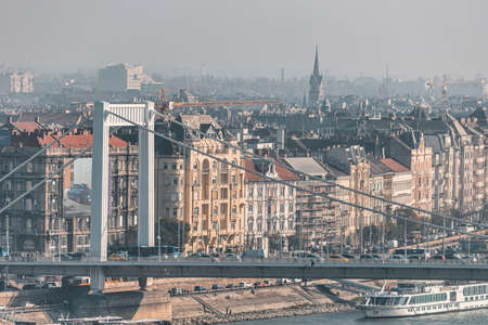 BUDAPEST, HUNGARY - OCTOBER, 2019: Mourning view of Budapest city and Elizabeth bridge over Danube...