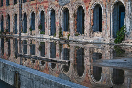 Old abandoned building with beautiful reflection in Bosnia and Herzegovina