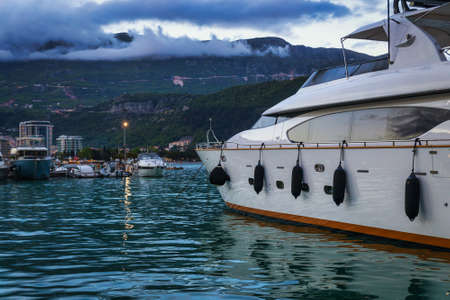 Evening view of yacht in marina in Budva, famous resort in Montenegroの写真素材