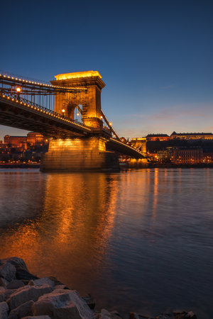 Famous Chain bridge over Danune river view at sunsetの写真素材