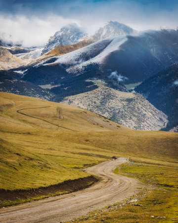 Scenic road in mountains of Kyrgyzstan, autumn landscapeの写真素材