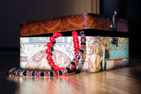 open old wooden casket for jewellery and beadsの写真素材