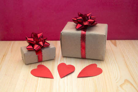 boxes with gifts on red background,concept for Valentines day, anniversary, romantic gift.の写真素材