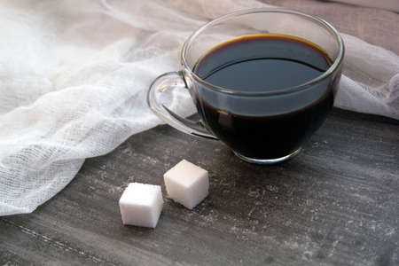 morning black coffee with sugar cubes, soft focus, natural lightの写真素材