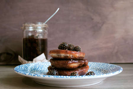 homemade chocolate pancakes served with pine cones jamの写真素材