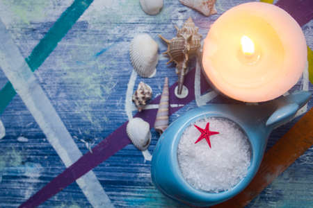 Spa concept. Seashells , candles and  sea saltの写真素材