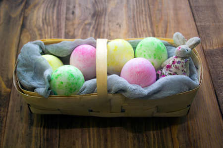 Easter eggs on a wooden tableの写真素材