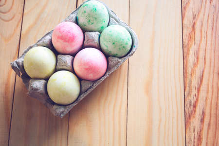 Easter eggs on a wooden tableの写真素材