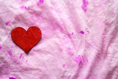 heart on textile backgroundの写真素材