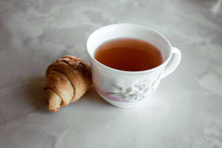 tea and  croissantの写真素材