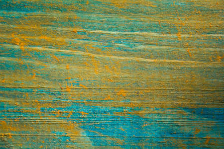 texture of wooden planks painted in gold and blueの写真素材