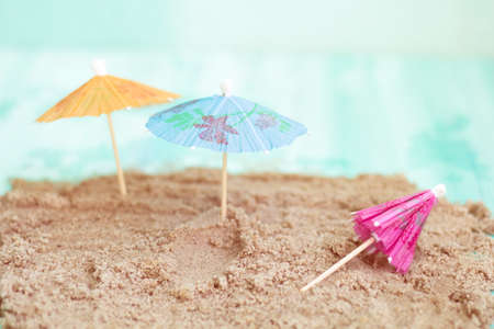 toy sun loungers on the beachの写真素材