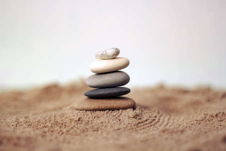 pyramid of stones on the beachの写真素材