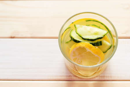 water with lemon and cucumber. copy space. top view.の写真素材