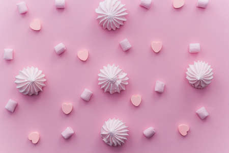 Pink sweets top view pattern on pink pastel background