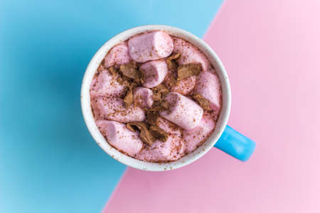 hot chocolate with marshmallows  top view   pink and blue  backgroundの写真素材