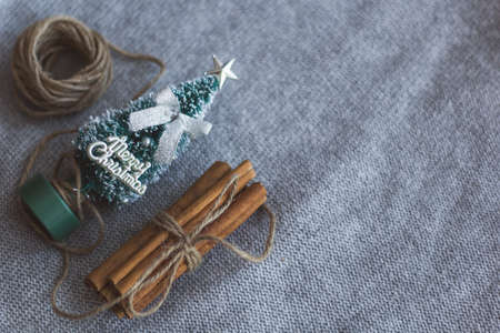 top view of small Christmas tree twine bunch of cinnamon sticksの写真素材