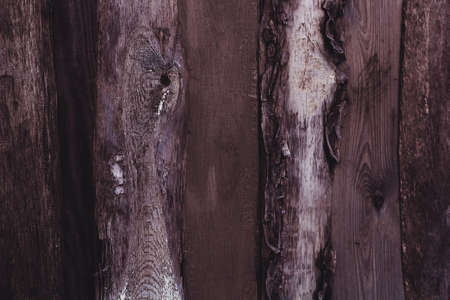 old dark brown wooden vertical  planks textureの写真素材