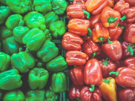 Top view Red Green Peppers on a market mobile photographyの写真素材