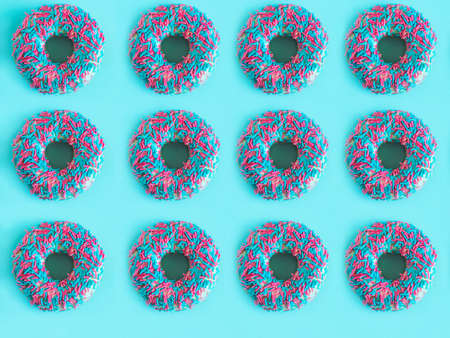 top view colorful donuts blue  background patternの写真素材