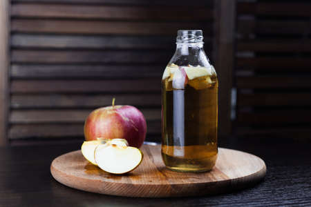 kombucha with apple wooden backgroundの写真素材