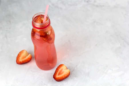 strawberry beverage bottle light background copy spaceの写真素材