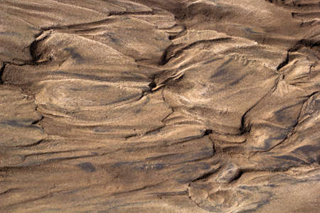 abstract background texture of wet sand and clay