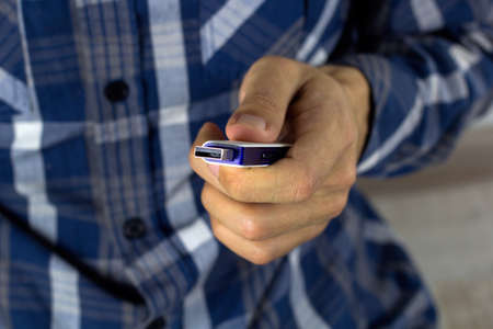 man hold usb flash  driveの写真素材