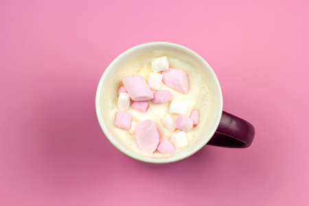 Top view hot beverage with whipped cream and marshmallows
