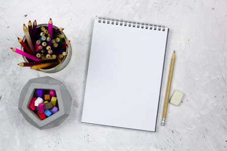 top view bright working place notebook with empty sheetcopy space and bright pencils